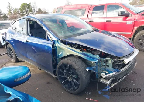 2023 Tesla Model Y Awd/Long Range Dual Motor All-Wheel Drive z USA, uszkodzony, nr VIN 7SAYGDEE1PA142167